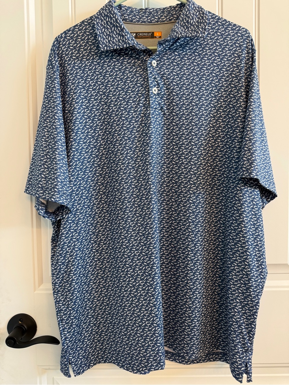 Cremieux men’s size large golf polo shirt.  Little bird design.